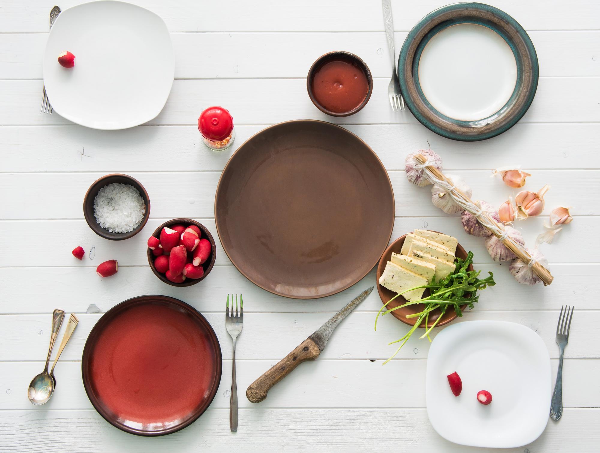 Selection of plated dishes on a wooden table